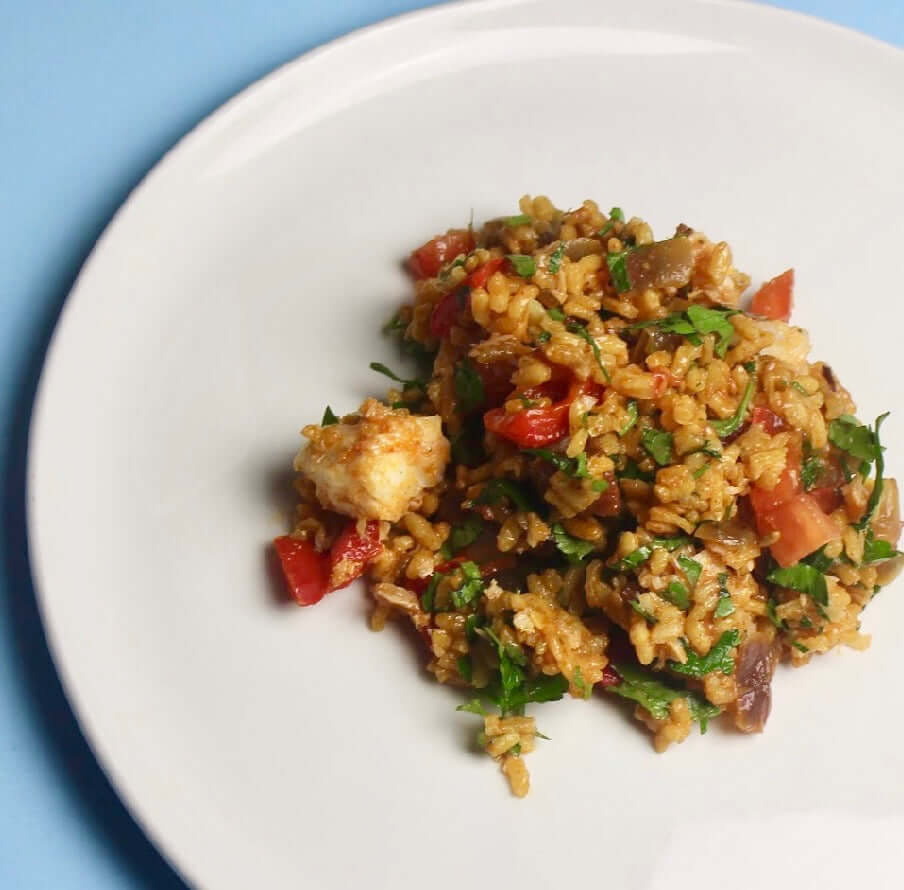 Cod & Chorizo Paella | Cod is a great source of stress-busting B vitamins & magnesium. Enjoy in a rich Paella dish with chorizo, spices, fresh tomatoes & herbs.