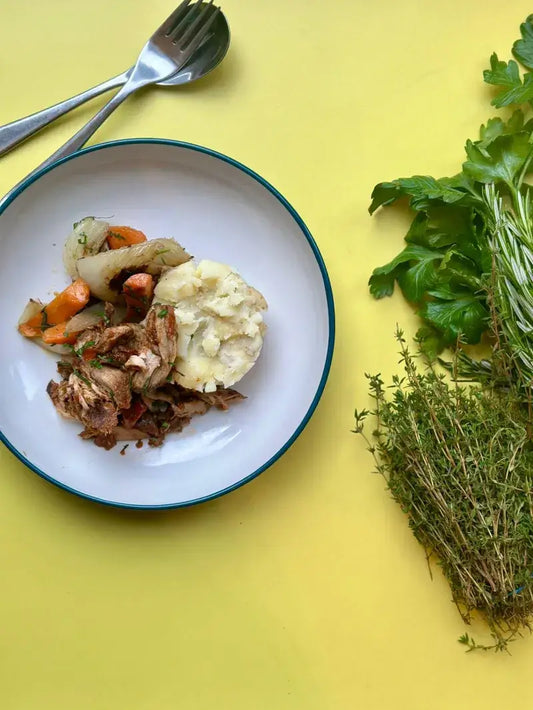 Nutritious High Protein Pulled Pork Savour High Protein Pulled Pork with herbs, wine, roasted fennel, carrots, and crushed potatoes—542 Kcal, 49g protein, 43g carbs, 22g fat. Hearty and nutritious